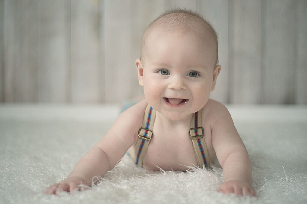 Infant Laughing On Belly